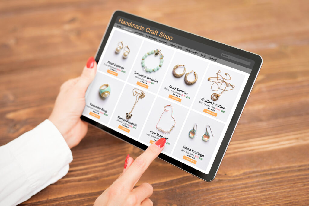 Woman shopping online for custom and hand made jewelry